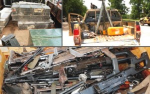 Guns, a pick-up van and boxes of ammunition seized by troops from Boko Haram insurgents in Kodunga, Borno State... on Friday.