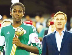 Oshoala with her Golden Ball and Golden Boot awards at the U-20 Women’s World Cup in Canada