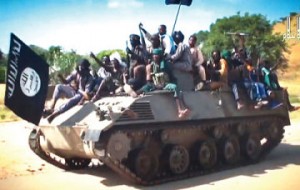 A screen grab from a new video released on Sunday by Boko Haram showing its members patrolling the streets of one of its captured towns in the North-East