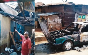 One of the buildings and a car burnt by thugs in Ibadan ... on Sunday. | credits: Olufemi Atoyebi