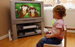 Children addicted to television at higher risk...Embargoed to 0500 Monday October 1 PICTURE POSED BY MODEL. Undated file photo of a young child in front of a television. Children who watch television excessively at a young age are at greater risk of developing behavioural problems and poor social skills, according to a new study. PRESS ASSOCIATION Photo. Issue date: Monday October 01, 2007. American researchers found that a sustained, high level of viewing in children under five-and-a-half years old increased the chances of them having behaviour problems in the future. Children of five-and-a-half who were watching two or more hours a day were also more likely to have fewer social skills, although sustained viewing had less of a link to this. See PA Story HEALTH Television. Photo credit should read: Peter Byrne/PA Wire
